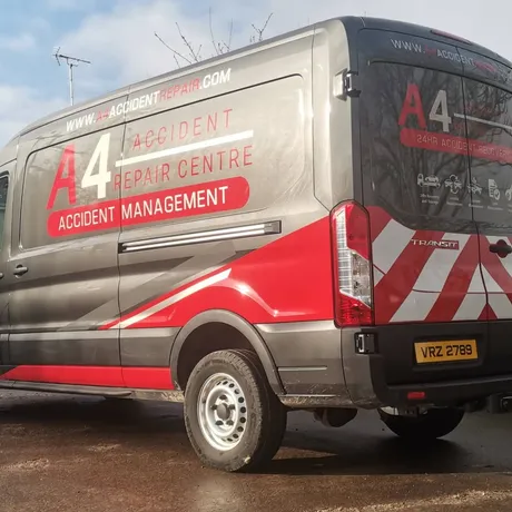 A4 Accident Repair Centre transit van finished in a grey, red and chevron vinyl wrap.