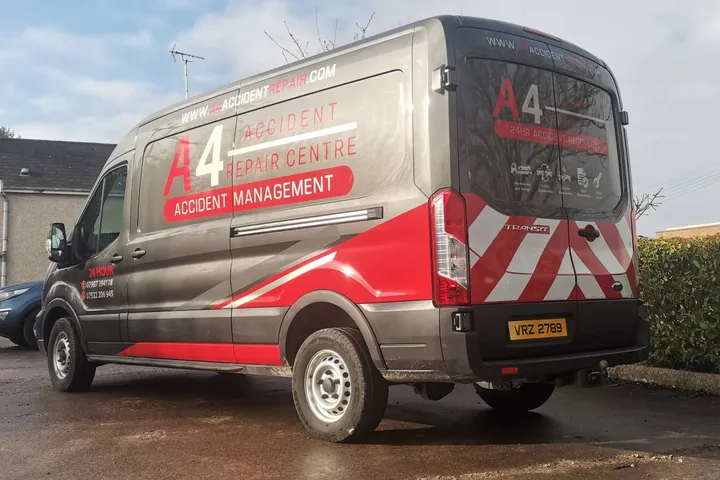 A4 Accident Repair Centre transit van finished in a grey, red and chevron vinyl wrap.