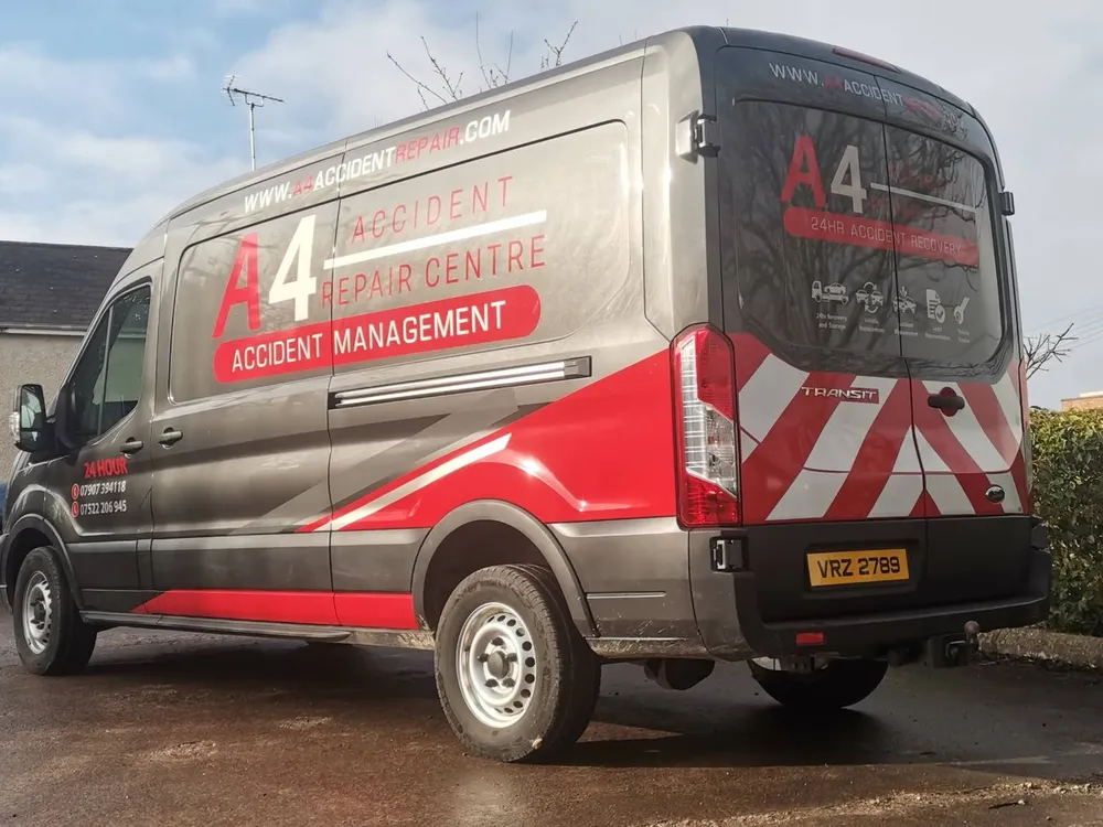 A4 Accident Repair Centre transit van finished in a grey, red and chevron vinyl wrap.