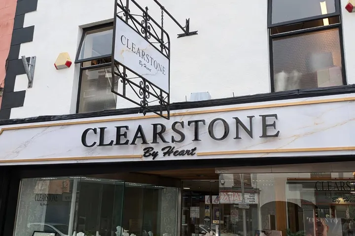 Clearstone by Heart jewellery shop front with a wrought-iron hanging sign and marble-effect fascia lettering.