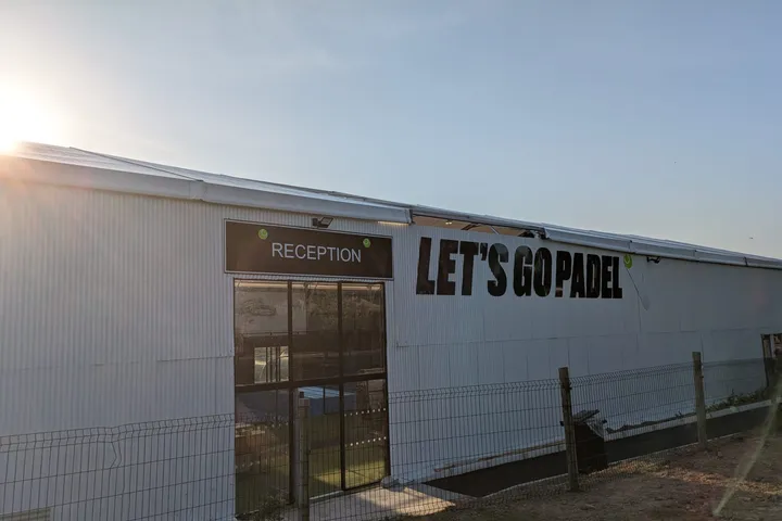 Let's Go Padel building signage and reception sign at the entrance to one of the new venues.
