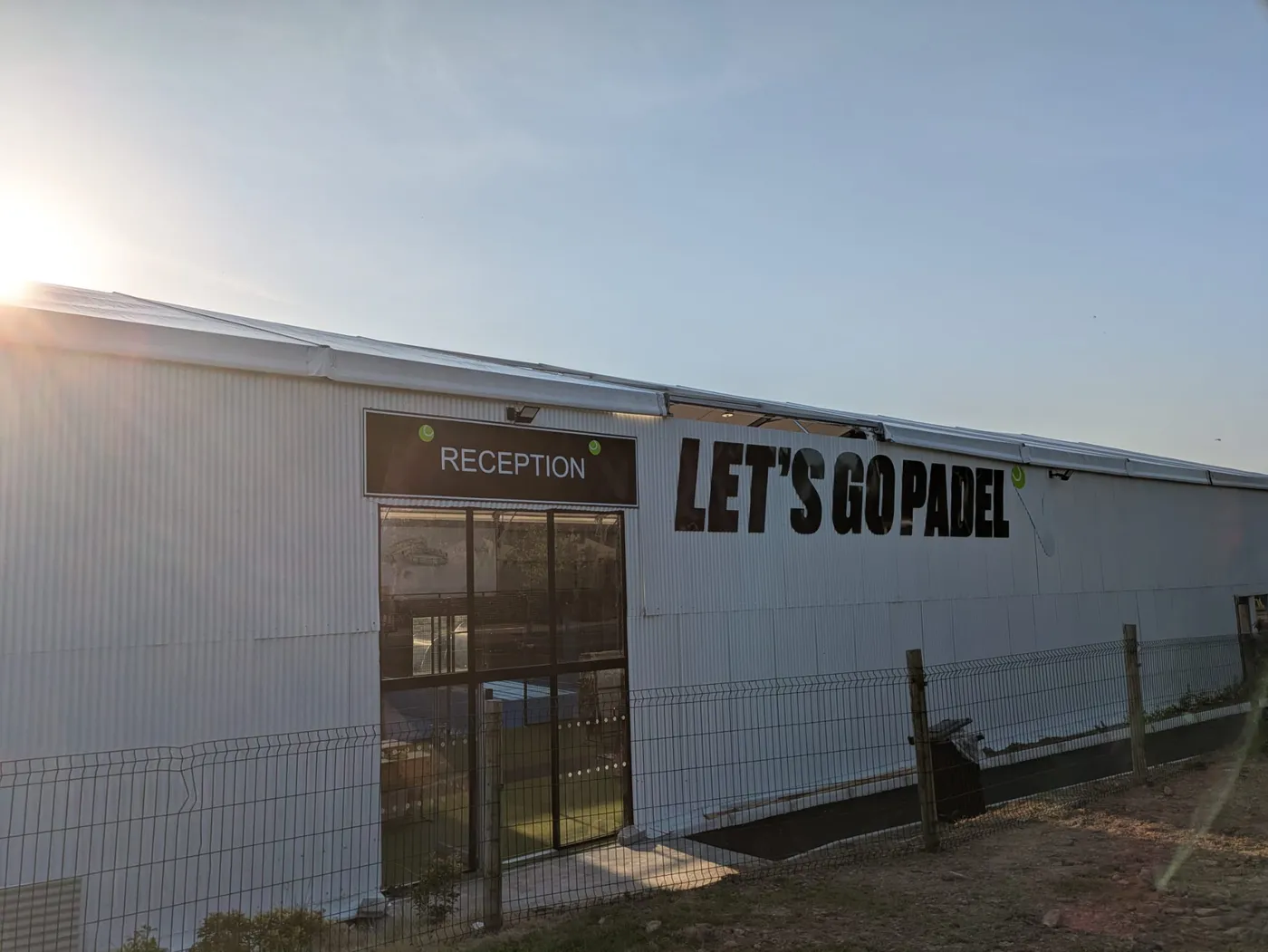 Let's Go Padel building signage and reception sign at the entrance to one of the new venues.
