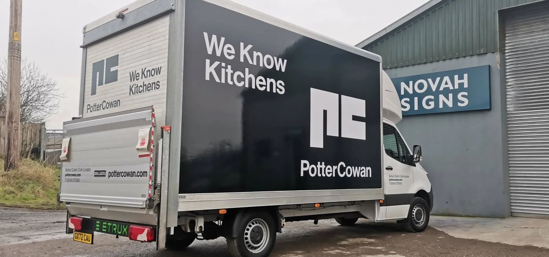 Potter Cowan box truck with a full vehicle wrap, photographed outside the Novah Signs workshop in Augher.