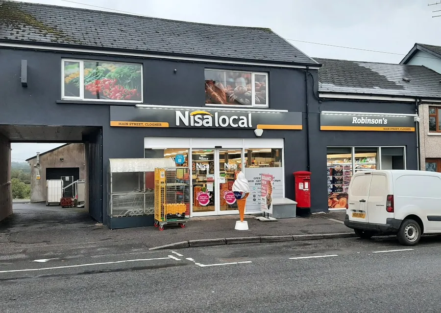 Robinson's Nisa Local shop front on Main Street, Clogher, with illuminated fascia signage.