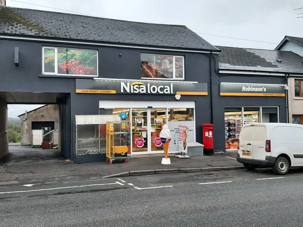 Robinson's Nisa Local shop front on Main Street, Clogher, with illuminated fascia signage.